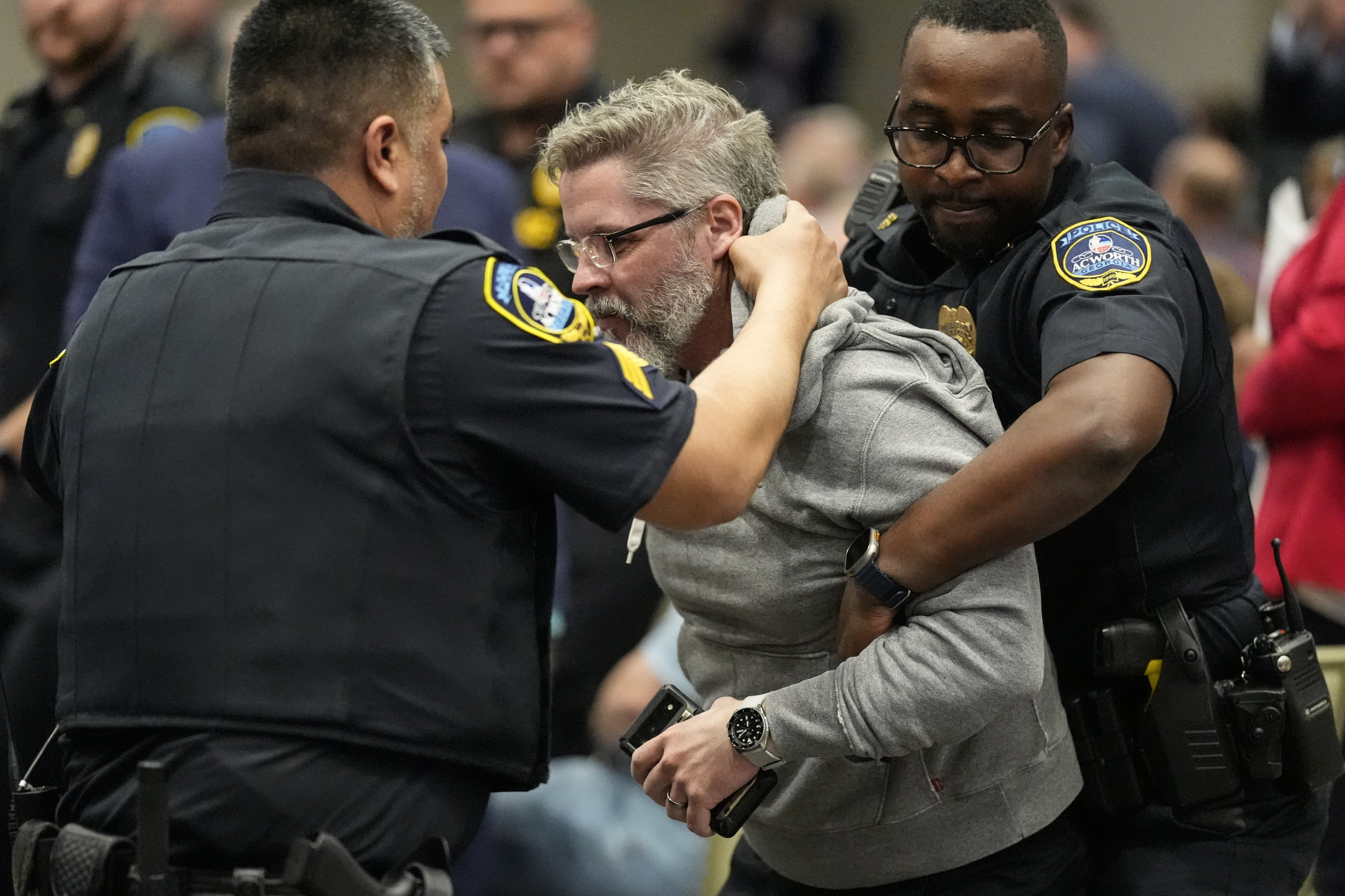 Marjorie Taylor Greene Issues Statement After Town Hall Protesters Tasered